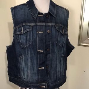 Denim vest with distressed arms
